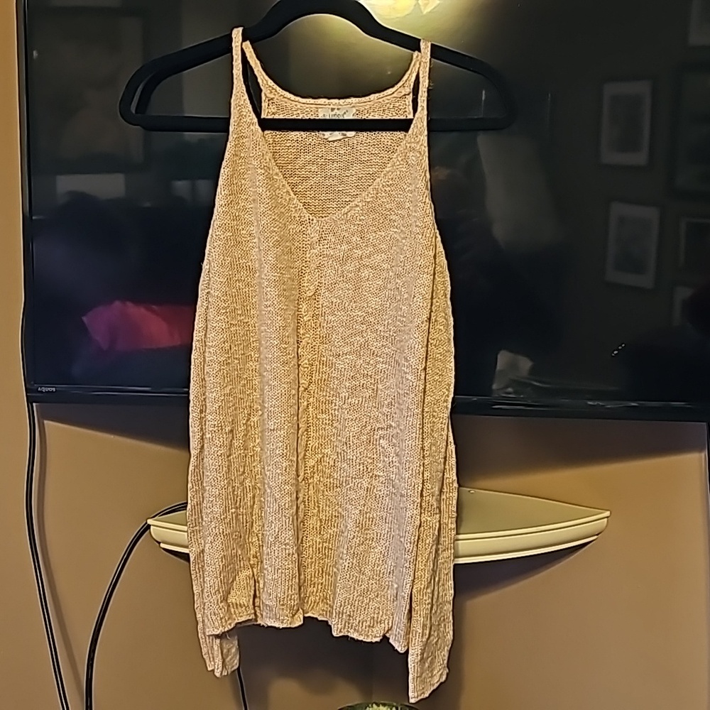 Lite pink off the shoulders sweater. Gently used